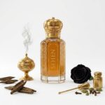 Amiri oudh attar alcohol free perfume oil long lasting woody spicy fragrance with rose and cardamom notes India