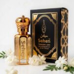 Juhi attar perfume oil bottle with premium black packaging box, alcohol free floral fragrance India