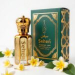 Nag Champa attar perfume oil with premium green and gold packaging box