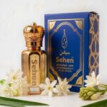 Rajnigandha attar perfume oil with premium blue and gold packaging box - Encased in a premium blue and gold box, Rajnigandha Attar reflects sophistication and purity. Its balanced floral profile makes it ideal for both personal use and gifting.
