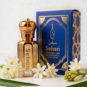 Rajnigandha attar perfume oil with premium blue and gold packaging box - Encased in a premium blue and gold box, Rajnigandha Attar reflects sophistication and purity. Its balanced floral profile makes it ideal for both personal use and gifting.