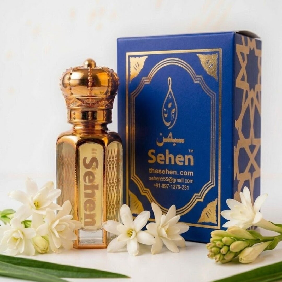 Rajnigandha attar perfume oil with premium blue and gold packaging box - Encased in a premium blue and gold box, Rajnigandha Attar reflects sophistication and purity. Its balanced floral profile makes it ideal for both personal use and gifting.